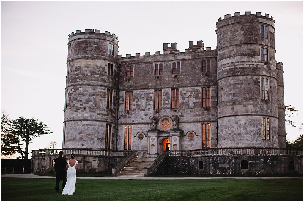 Glamorous Lulworth castle wedding with a firework extravaganza